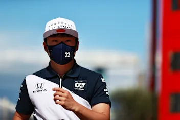 MONTE-CARLO, MONACO - MAY 19: Yuki Tsunoda of Japan and Scuderia AlphaTauri walks in the Paddock