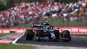 BUDAPEST, HUNGARY - AUGUST 01: Sebastian Vettel of Germany driving the (5) Aston Martin AMR21