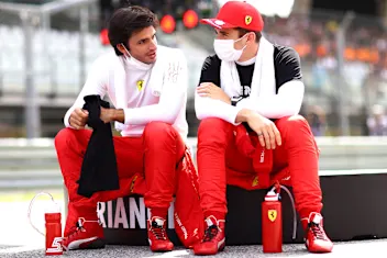 SPIELBERG, AUSTRIA - JUNE 27: Carlos Sainz of Spain and Ferrari and Charles Leclerc of Monaco and