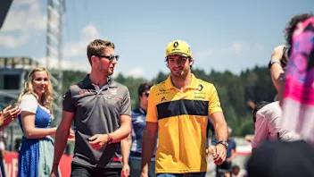 Romain Grosjean (FRA) Haas F1 and Carlos Sainz jr (ESP) Renault Sport F1 Team on the drivers parade