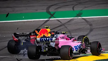 Race leader Max Verstappen, Red Bull Racing RB14 crashes whilst lapping Esteban Ocon, Racing Point