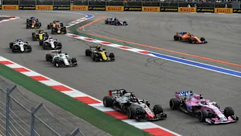 Sergio Perez, Racing Point Force India VJM11 and Romain Grosjean, Haas F1 Team VF-18 at Formula One