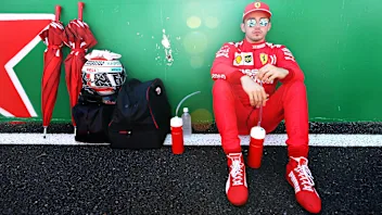 SUZUKA, JAPAN - OCTOBER 13: Charles Leclerc of Monaco and Ferrari prepares to drive on the grid