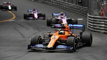 MONTE CARLO, MONACO - MAY 26: Lando Norris, McLaren MCL34, leads Lance Stroll, Racing Point RP19,