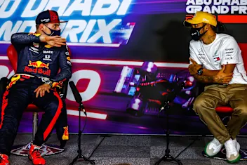 ABU DHABI, UNITED ARAB EMIRATES - DECEMBER 13: Race winner Max Verstappen of Netherlands and Red