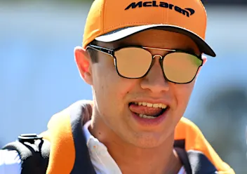 MELBOURNE, AUSTRALIA - MARCH 12: Lando Norris of Great Britain and McLaren F1 looks on in the