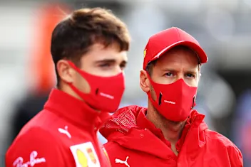 SPA, BELGIUM - AUGUST 30: Sebastian Vettel of Germany and Ferrari and Charles Leclerc of Monaco and