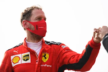 IMOLA, ITALY - NOVEMBER 01: Sebastian Vettel of Germany and Ferrari looks on in parc ferme during