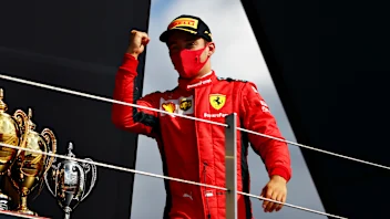 NORTHAMPTON, ENGLAND - AUGUST 02: Third placed Charles Leclerc of Monaco and Ferrari celebrates on