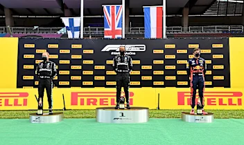 SPIELBERG, AUSTRIA - JULY 12: Race winner Lewis Hamilton of Great Britain and Mercedes GP (C),