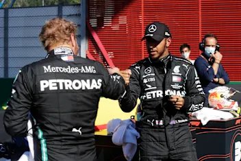 SCARPERIA, ITALY - SEPTEMBER 12: Pole position qualifier Lewis Hamilton of Great Britain and