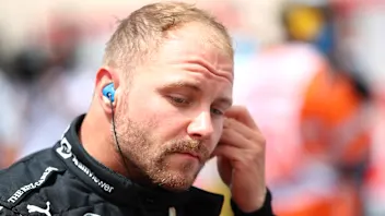 LE CASTELLET, FRANCE - JUNE 20: Valtteri Bottas of Finland and Mercedes GP walks to the grid during