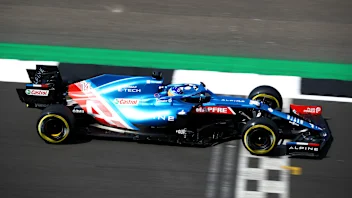 NORTHAMPTON, ENGLAND - JULY 16: Fernando Alonso of Spain driving the (14) Alpine A521 Renault