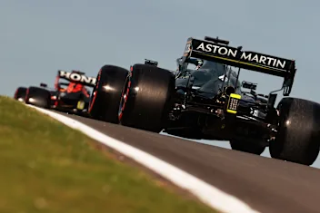 NORTHAMPTON, ENGLAND - JULY 16: Lance Stroll of Canada driving the (18) Aston Martin AMR21 Mercedes