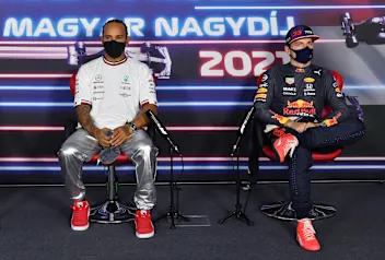 BUDAPEST, HUNGARY - JULY 31: Pole position qualifier Lewis Hamilton of Great Britain and Mercedes