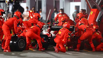 DOHA, QATAR - NOVEMBER 21: Carlos Sainz of Spain driving the (55) Scuderia Ferrari SF21 makes a