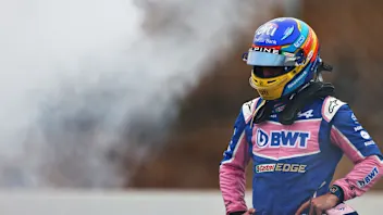 BARCELONA, SPAIN - FEBRUARY 25: Fernando Alonso of Spain and Alpine F1 looks on after stopping on