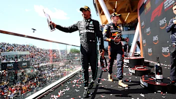 MONTREAL, QUEBEC - JUNE 19: Third placed Lewis Hamilton of Great Britain and Mercedes celebrates on