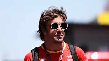 BARCELONA, SPAIN - MAY 19: Fernando Alonso of Spain and Alpine F1 walks in the Paddock during