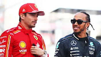 BAHRAIN, BAHRAIN - MARCH 2: (L-R) Charles Leclerc of Monaco and Scuderia Ferrari talks to Lewis