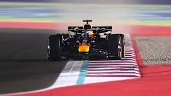 LUSAIL CITY, QATAR - NOVEMBER 28: Lewis Hamilton of Great Britain driving the (44) Scuderia Ferrari