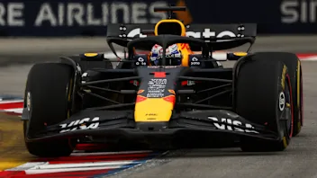 SINGAPORE, SINGAPORE - OCTOBER 04: Max Verstappen of the Netherlands driving the (1) Oracle Red