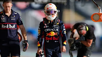 AUSTIN, TEXAS - OCTOBER 17: Yuki Tsunoda of Japan and Oracle Red Bull Racing walks in the Pitlane