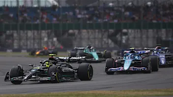 NORTHAMPTON, ENGLAND - JULY 09: Lewis Hamilton of Great Britain driving the (44) Mercedes AMG
