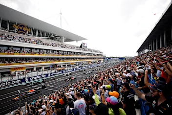 MIAMI, FLORIDA - MAY 07: Sergio Perez of Mexico driving the (11) Oracle Red Bull Racing RB19 leads