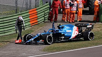IMOLA, ITALY - APRIL 16: Esteban Ocon of France and Alpine F1 Team inspects his car after stopping
