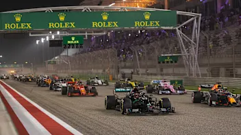 (L to R): George Russell (GBR) Mercedes AMG F1 W11 and Max Verstappen (NLD) Red Bull Racing RB16 at