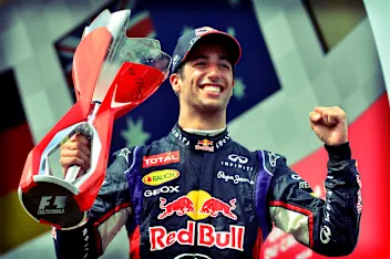 Race winner Daniel Ricciardo (AUS) Red Bull Racing celebrates on the podium with the