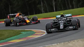 Finnish Formula One driver Valtteri Bottas of Mercedes-AMG Petronas (R) and Dutch Formula One
