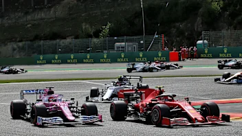Sergio Perez (MEX) Racing Point F1 Team RP19 and Charles Leclerc (MON) Ferrari SF1000 battle for