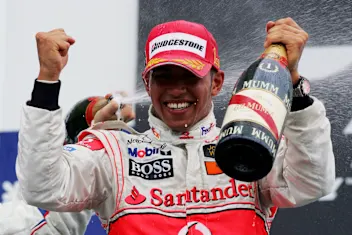 Race winner Lewis Hamilton (GBR) McLaren celebrates on the podium. Formula One World Championship,