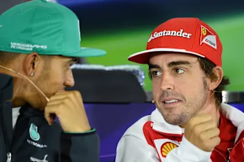 Lewis Hamilton (GBR) Mercedes AMG F1 and Fernando Alonso (ESP) Ferrari in the Press