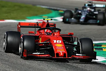 MONZA, ITALY - SEPTEMBER 08: Charles Leclerc of Monaco driving the (16) Scuderia Ferrari SF90 leads Lewis Hamilton of Great Britain driving the (44) Mercedes AMG Petronas F1 Team Mercedes W10 on track during the F1 Grand Prix of Italy at Autodromo di Monza on September 08, 2019 in Monza, Italy. (Photo by Charles Coates/Getty Images)