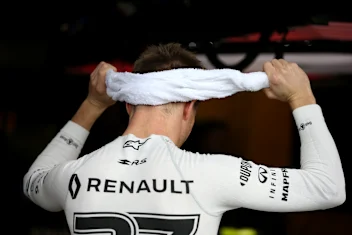 SINGAPORE, SINGAPORE - SEPTEMBER 20: Nico Hulkenberg of Germany and Renault Sport F1 tries to cool