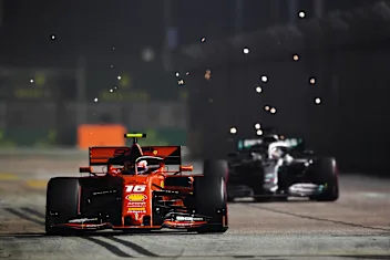 SINGAPORE, SINGAPORE - SEPTEMBER 22: Charles Leclerc of Monaco driving the (16) Scuderia Ferrari