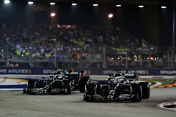 SINGAPORE, SINGAPORE - SEPTEMBER 22: Lewis Hamilton of Great Britain driving the (44) Mercedes AMG