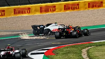 Kevin Magnussen (DEN) Haas VF-20 and Alexander Albon (THA) Red Bull Racing RB16 collide.           
