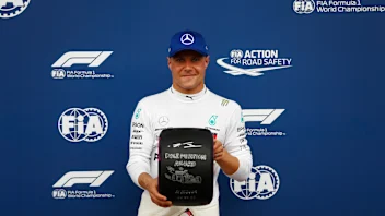 RED BULL RING, AUSTRIA - JUNE 30: Valtteri Bottas, Mercedes AMG F1, poses with the Pirelli pole