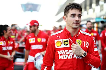 ABU DHABI, UNITED ARAB EMIRATES - NOVEMBER 30: Charles Leclerc of Monaco and Ferrari walks in the