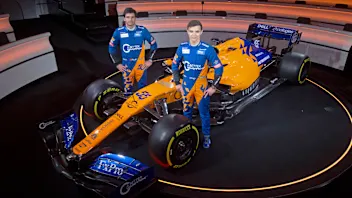 Lando Norris, Carlos Sainz with MCL34 2019 Launch