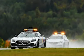 NUERBURG, GERMANY - OCTOBER 09: The FIA Safety Car and FIA Medical Car do a lap on track before