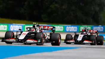 RED BULL RING, AUSTRIA - JULY 12: Kevin Magnussen, Haas VF-20, leads Romain Grosjean, Haas VF-20