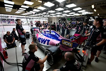 MEXICO CITY, MEXICO - OCTOBER 26: The Racing Point team work in the garage during final practice