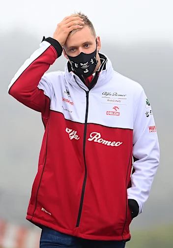 NUERBURG, GERMANY - OCTOBER 08: Mick Schumacher of Germany and Alfa Romeo Racing walks the track