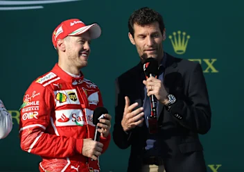 MELBOURNE, AUSTRALIA - MARCH 26: Race winner Sebastian Vettel of Germany and Ferrari talks with