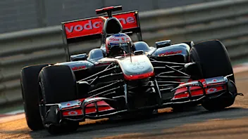 McLaren Mercedes' British driver Jenson Button drives at the Yas Marina circuit on November 13,